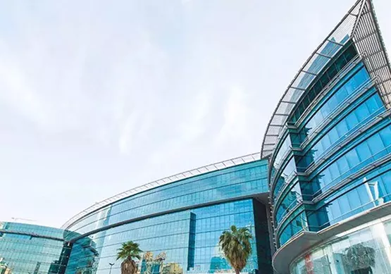 Al Akaria Plaza showcases sleek, curved glass architecture, offering a modern and prestigious business environment in the heart of Riyadh.